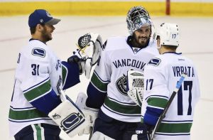 eddie-lack-ryan-miller-radim-vrbata-nhl-vancouver-canucks-st.-louis-blues-850x560